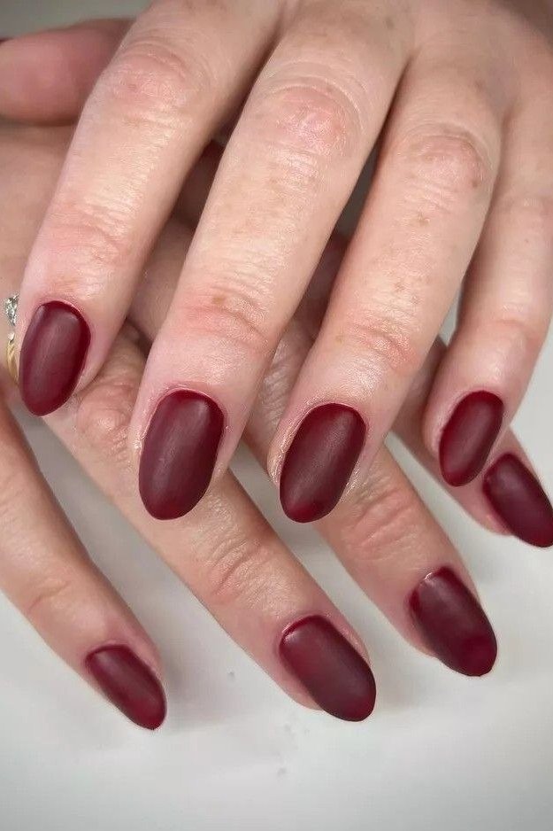 Matte burgundy almond, burgundy fall nail idea for women over 60
