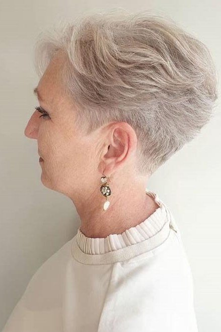 White curly tapered pixie side view - curly hairstyle for women over 60