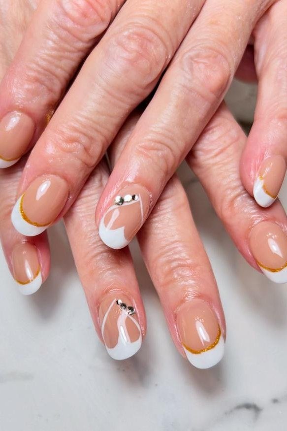 White french with gold and rhinestone art for older women