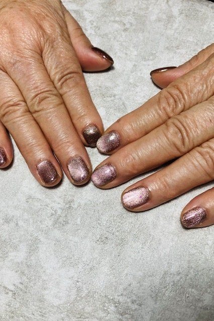 Dark Purple Cat Eye Nails - Deep purple with soft magnetic shimmer sits on short, oval nails.