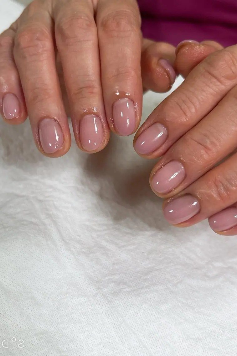 Dusty rose mauve gel nails for mature hands