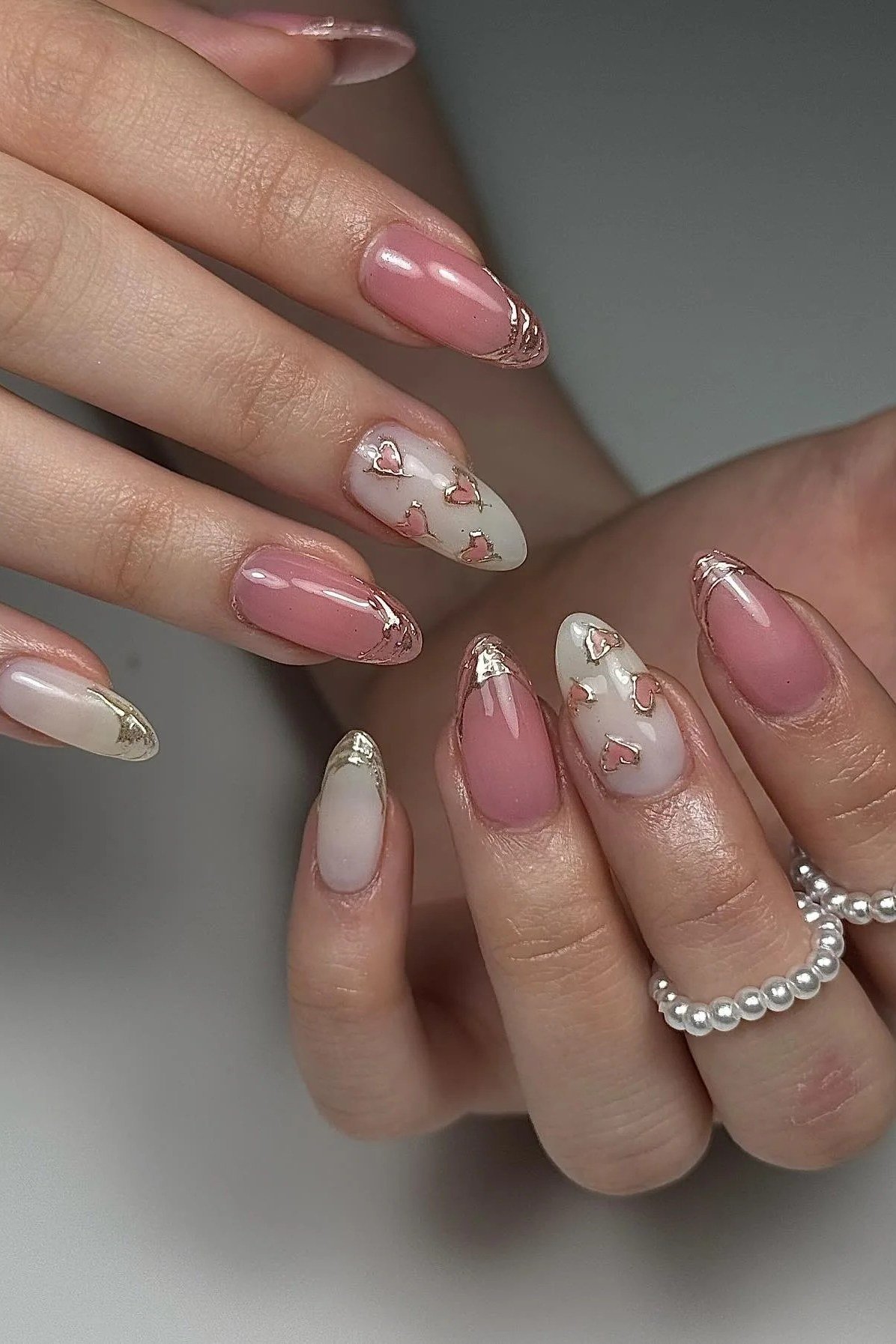 Deep rose nails with white floral nail art