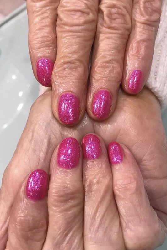 Hot Pink Glitter Nails for women over 60