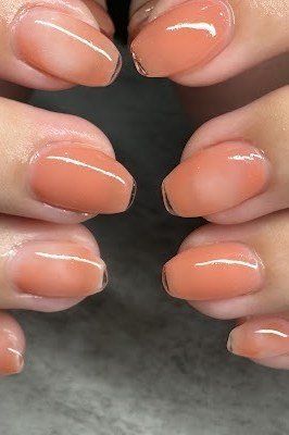 Coral peach glossy ombre, short oval nails, ombre nail design for women over 60