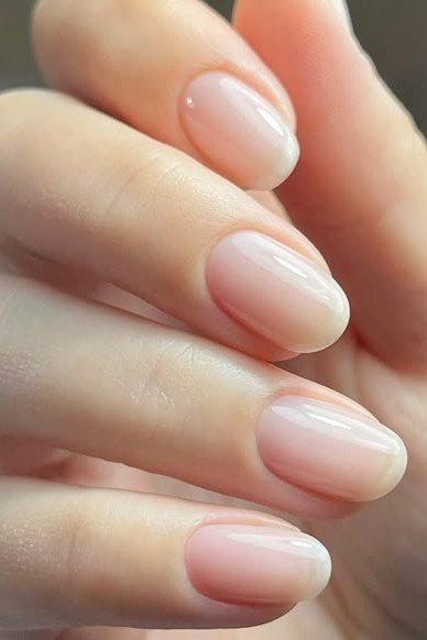 Sheer Pink Oval Close-Up - elegant nail art idea for mature hands, women over 50
