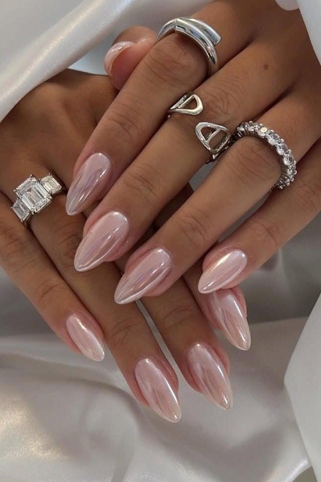 Pink Pearl Chrome with Bold Statement Rings - chrome nail designs for women over 60