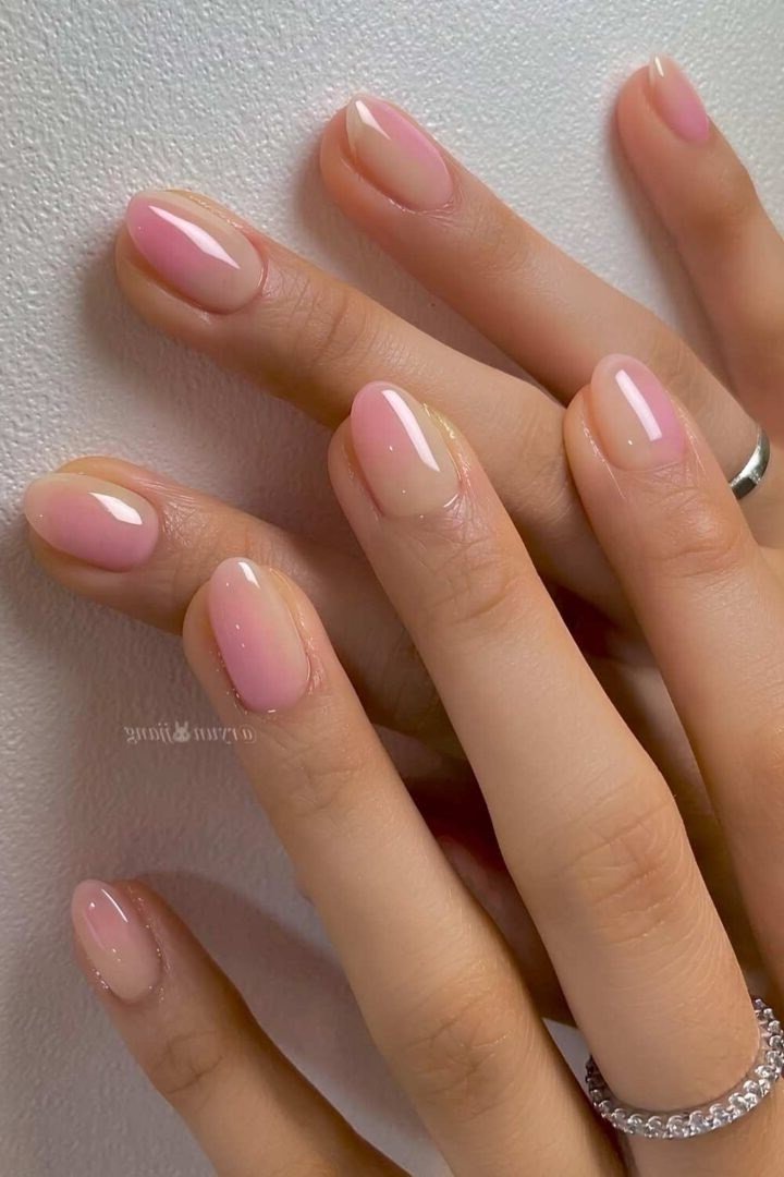 Short oval sheer pink strawberry glaze nails