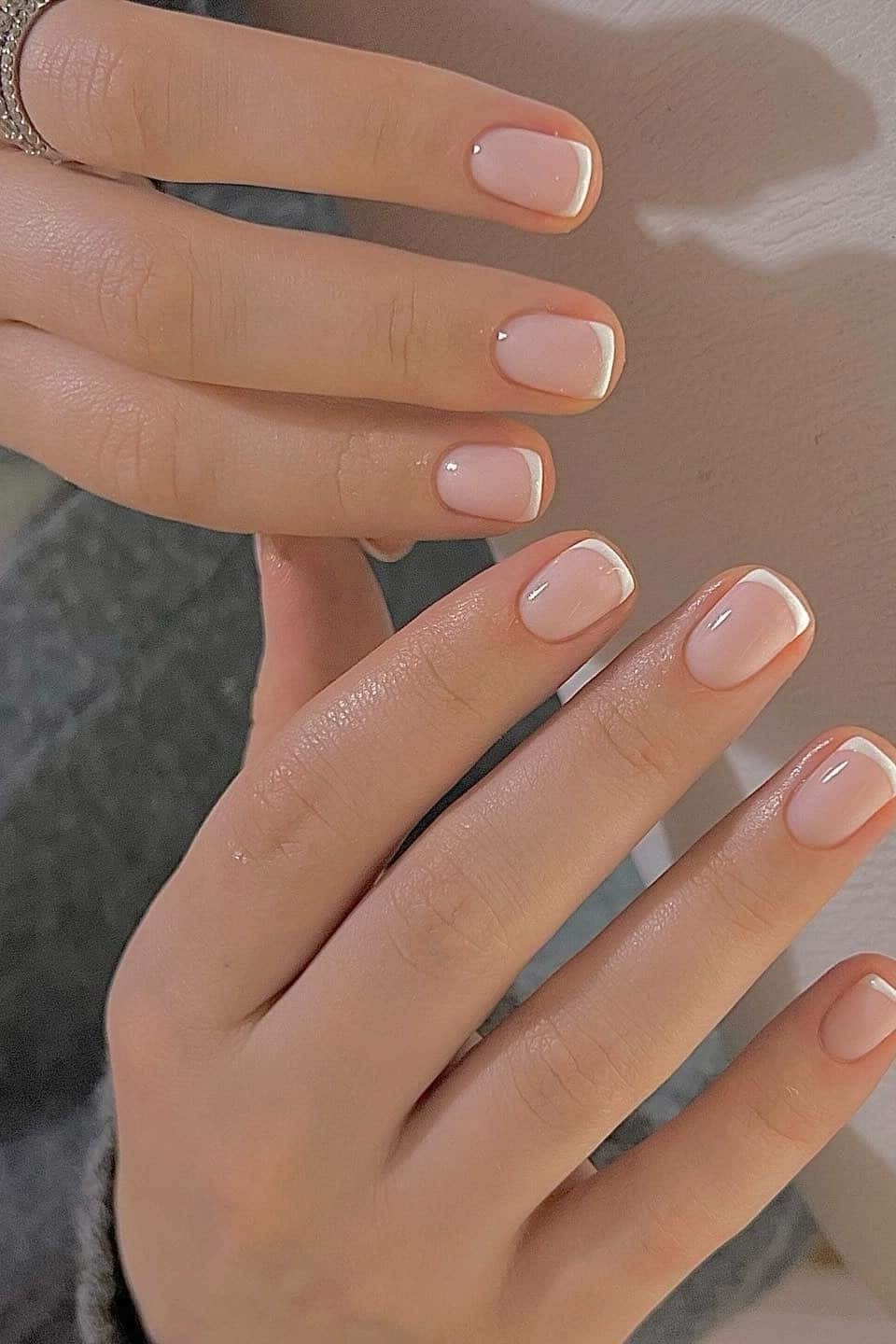 Classic French Short Squoval - short nail design for women over 60 that makes nails look longer