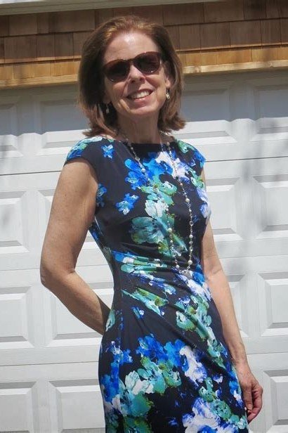 Navy sheath dress with blue-green floral print for women over 60