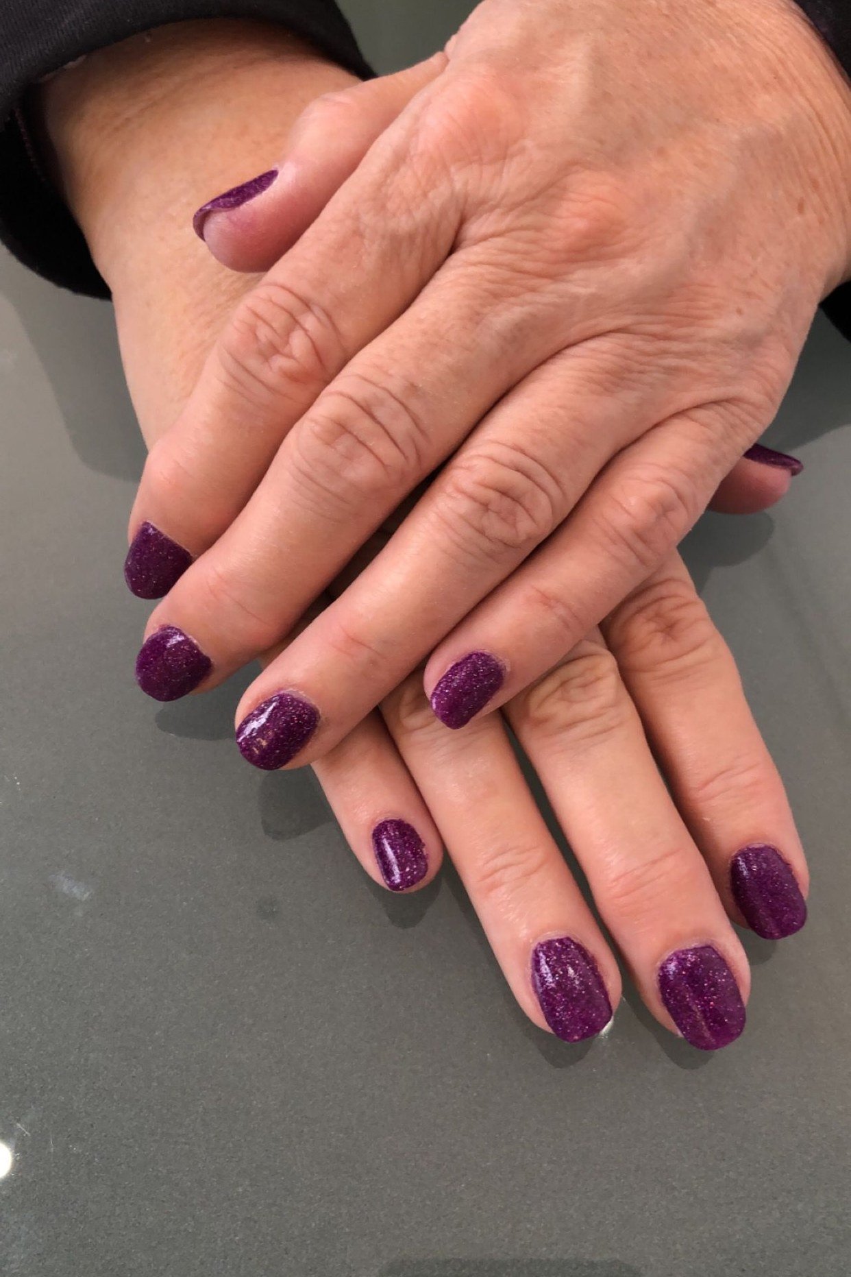 Vibrant Purple Nails - short nail design idea for women over 50