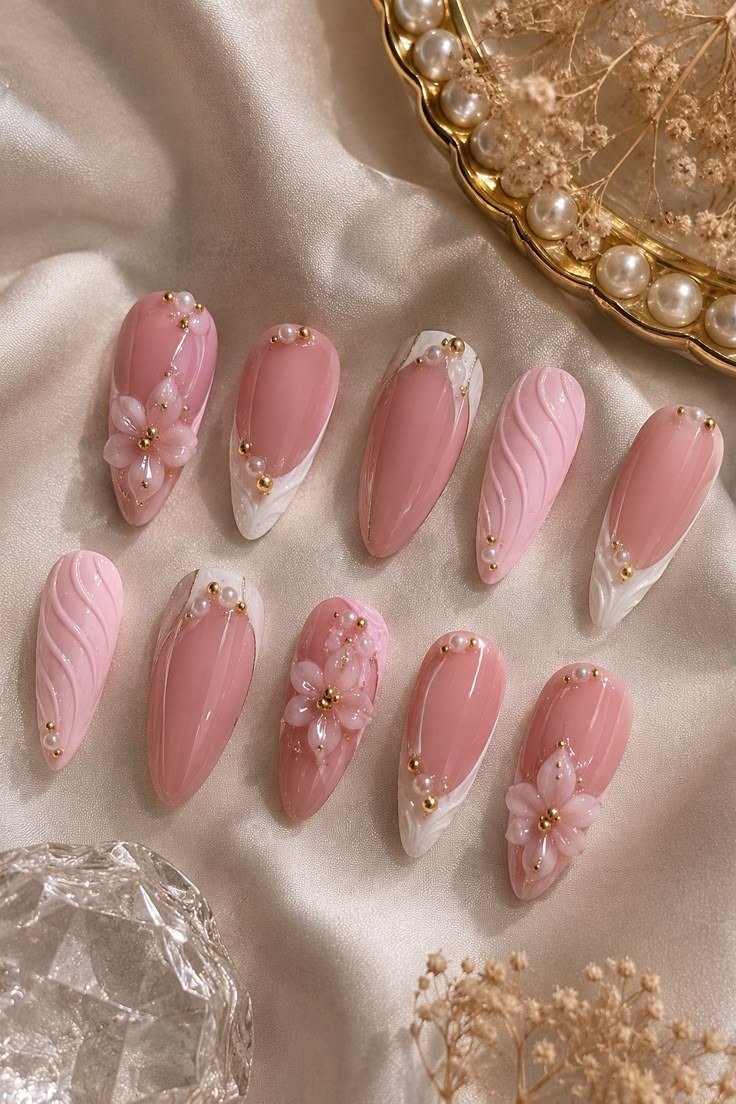 Pink almond press on nails with cherry blossom art