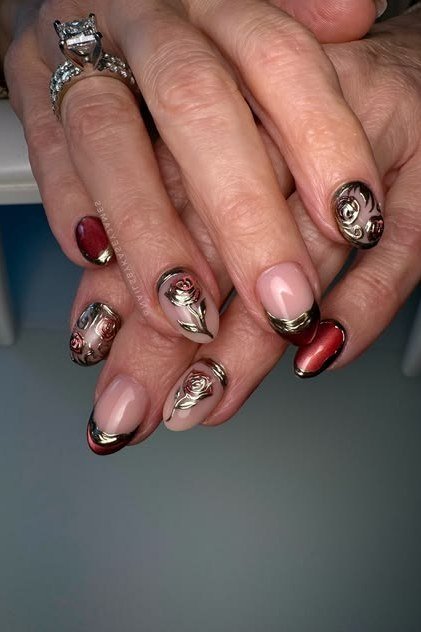 Red Nails with Gold Foil Art nail design for women over 40