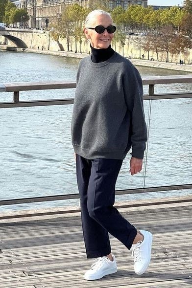 Charcoal knit sweater with navy trousers fall outfit idea for women over 60