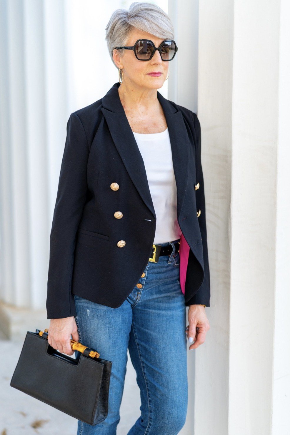 Black double breasted blazer with white tee and jeans for women over 60