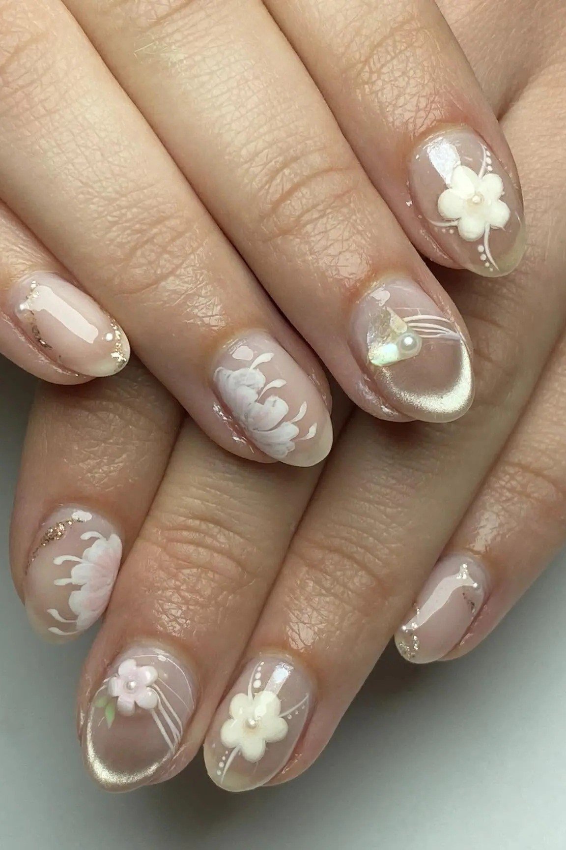 White 3D Floral Nails - nude nail art idea for women over 40