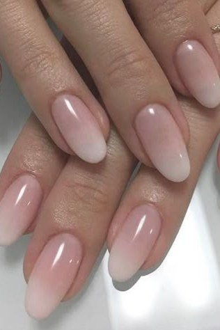 pink white baby boomer fade on medium almond nails