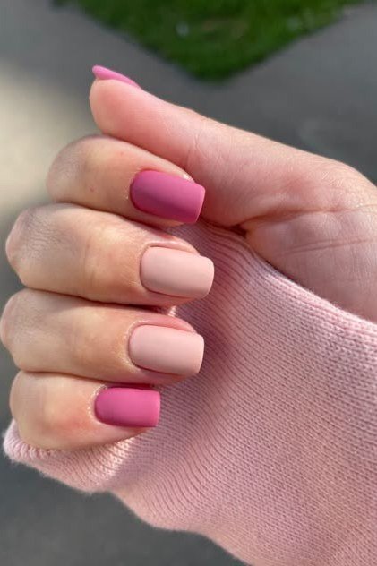 matte dusty rose nails with magenta accent nail