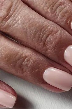 Pale Pink Nails Close-Up, understated glam nail color for women over 60