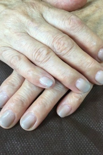 Milky white short nude nails for women over 50