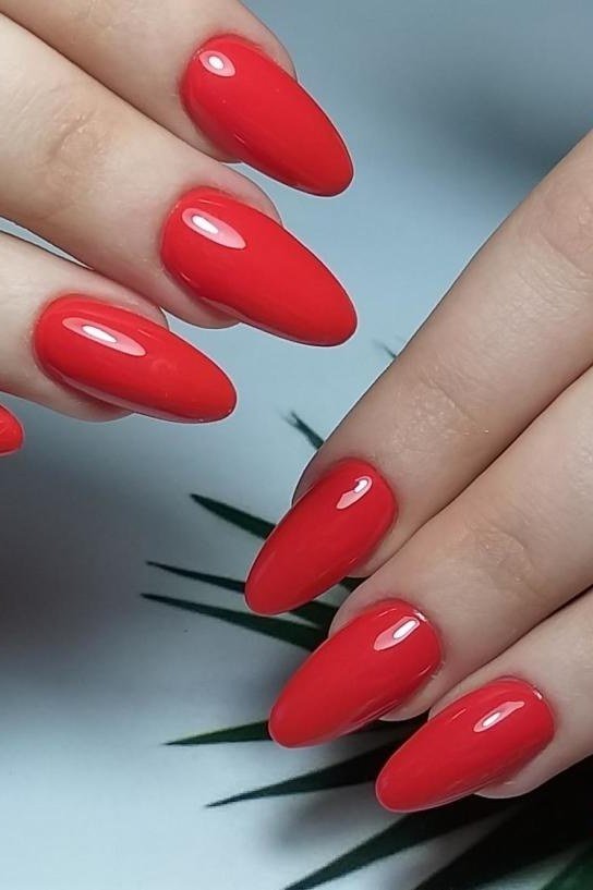 Red coral almond nails with ring