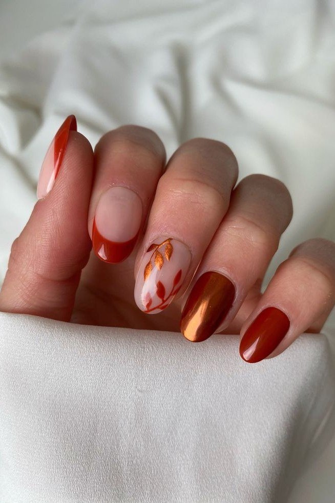 Rust red with copper tips and floral accent short, elegant fall nail design for women over 40
