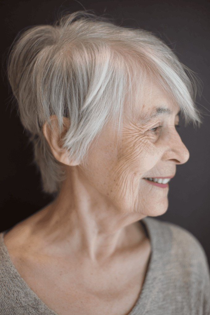 Timeless gray layered bob, smiling, timeless hairstyle for women over 70