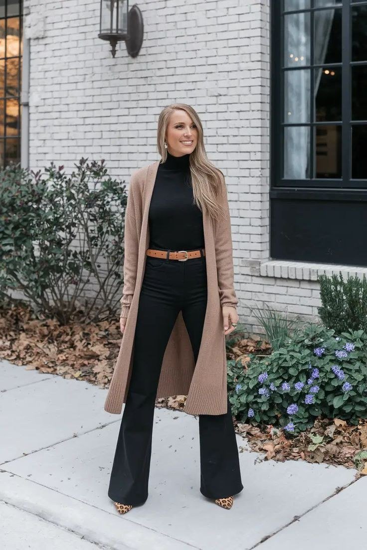 Camel coat an all black base camel long coat black turtleneck black wide pants - fall outfit idea for women over 40
