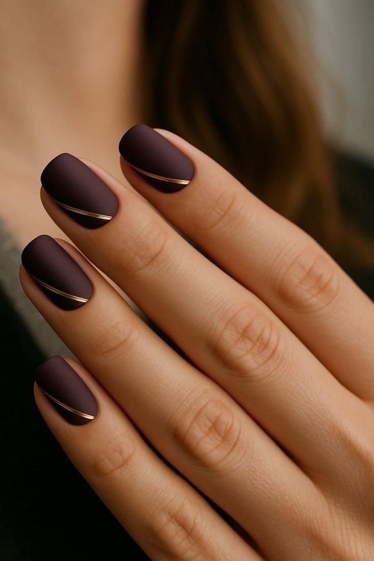 Deep Brown Almond Nails with Gold Line Accent - brown nail idea for women over 50