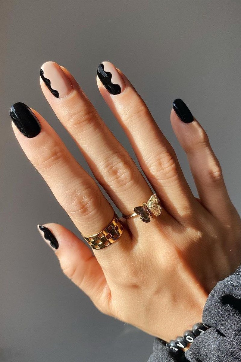 Nail art design for women over 60: black negative space nail art