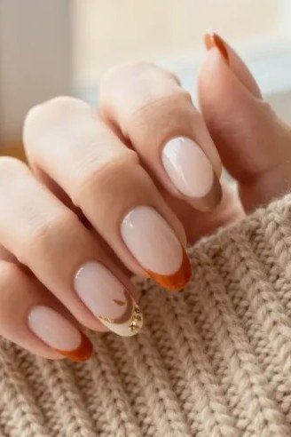 Nude Nails with Burnt Orange French Tips, fall nail color idea for women over 50