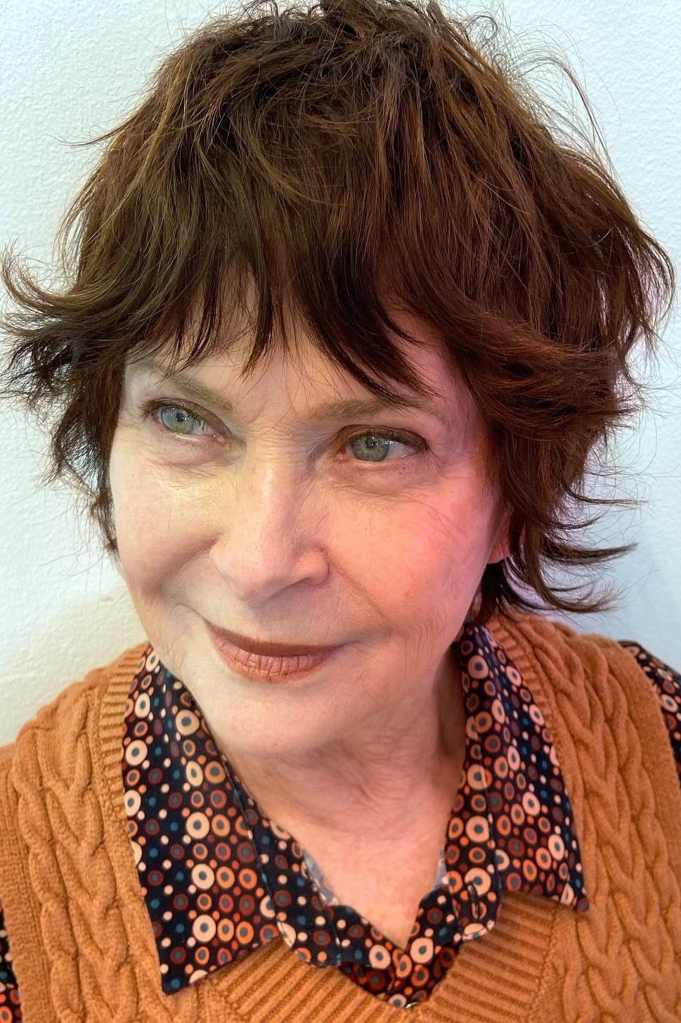 Brunette shaggy pixie haircut for women over 50