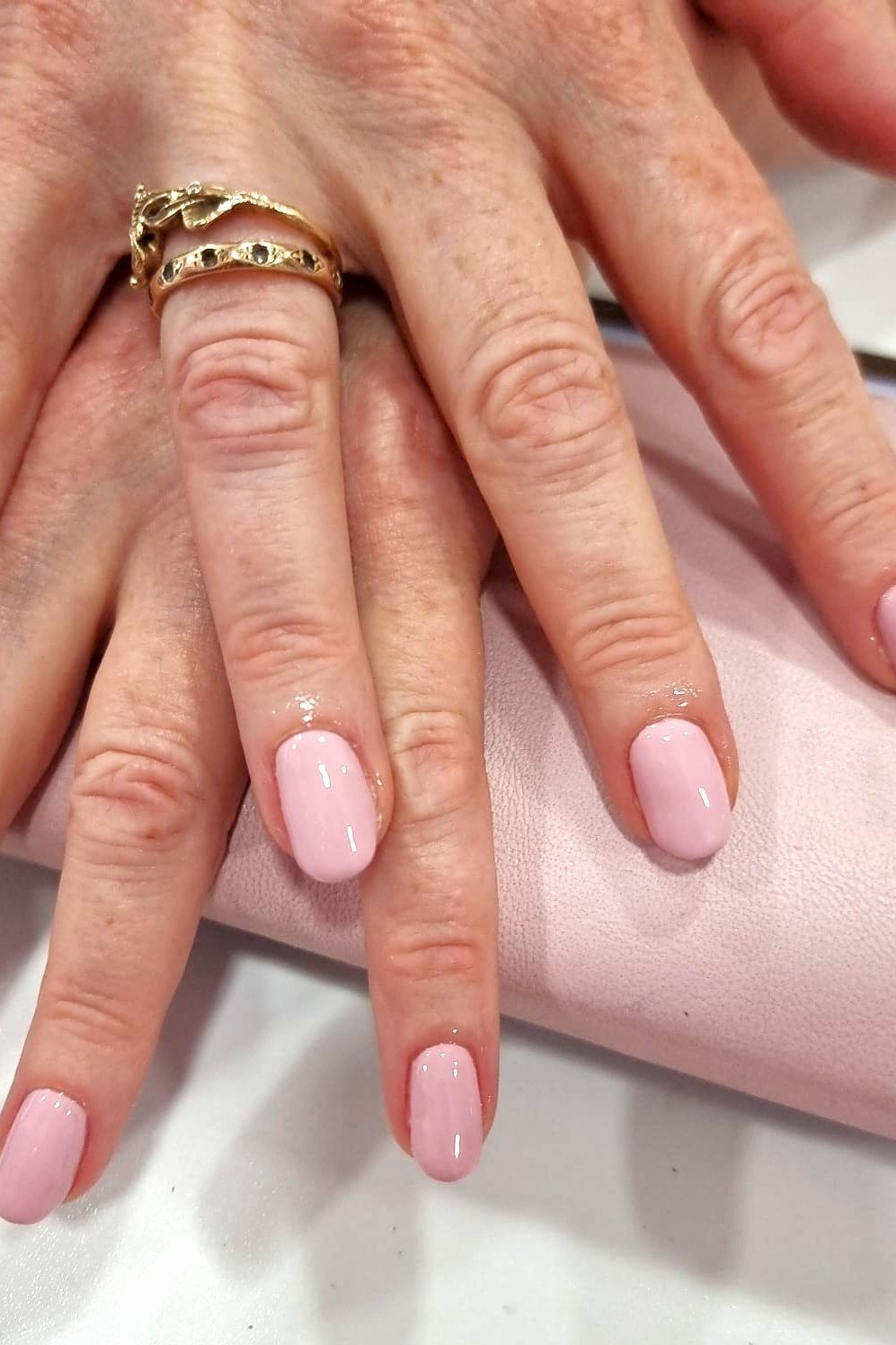 Soft Pink Manicure on Pink Clutch for women over 60