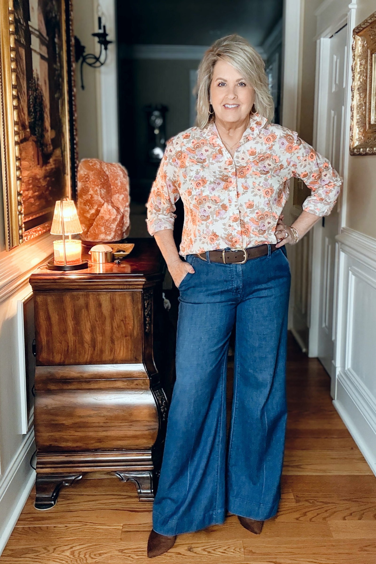 floral blouse dark wide leg jeans fall outfit over 50