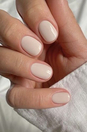 Milky nude short nails with white sleeve