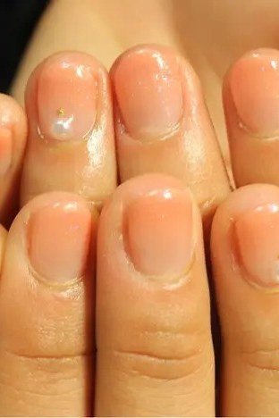 Peachy nude soft ombre, short nails, glossy, ombre nail design for women over 60