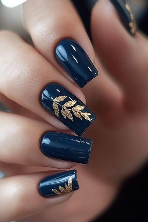 Navy blue with gold leaf art short square, elegant fall nail design for women over 40