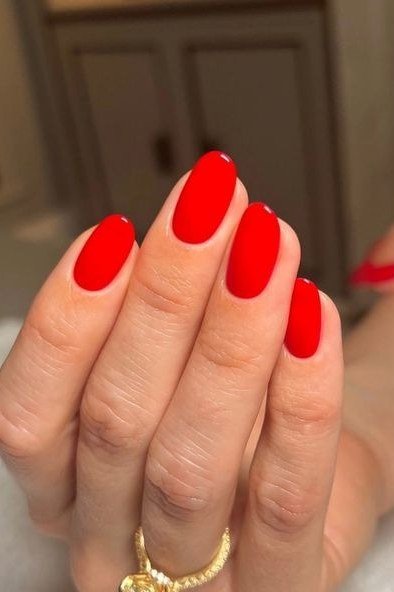 Best nails for women over 50: bold red classic