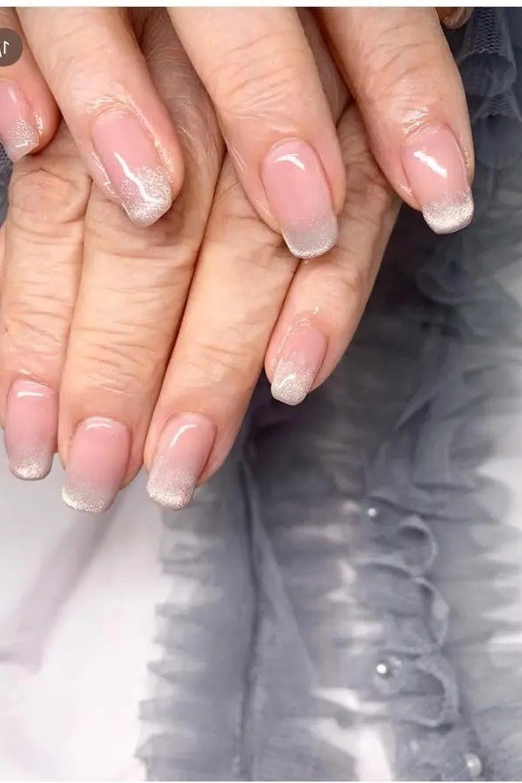 Pearl White Iridescent Nails - pearl white iridescent mature hands, glitter winter nail design for women over 60