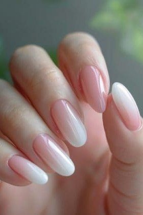 Very sheer milky pink on almond shaped nails