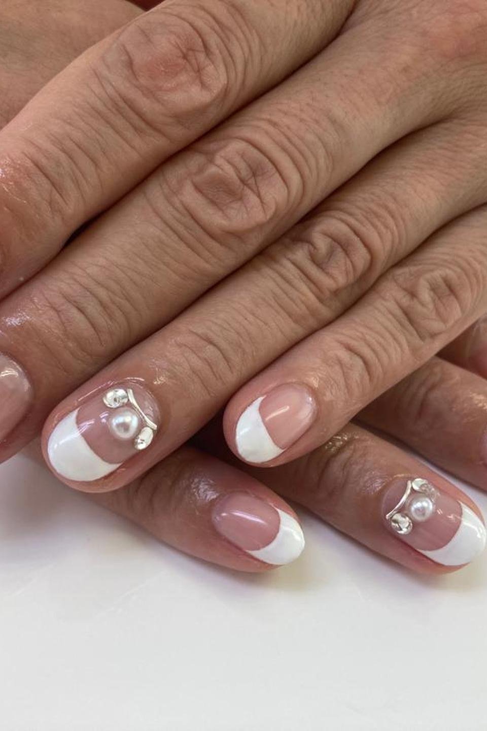 Pink and white french with pearl art for older women