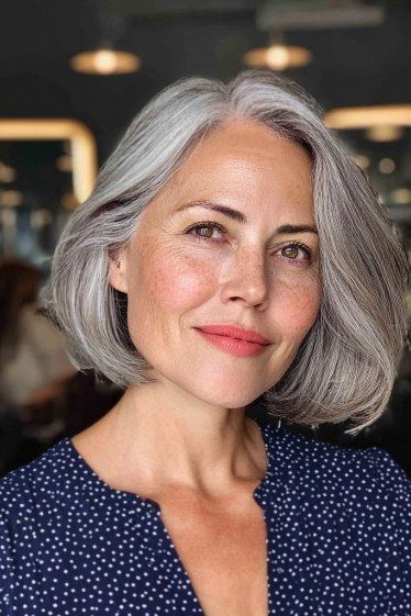 Silver side swept bob haircut for mature women