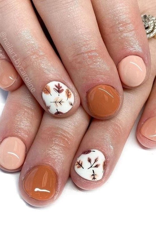 Nude and Caramel Nails with Leaf Accents, fall nail color idea for women over 50