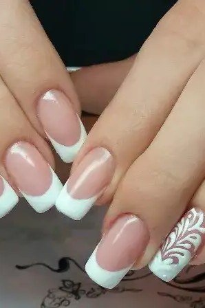 French tip nails with white lace accent nail