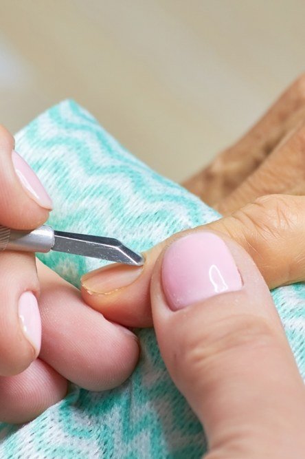 Using a wooden cuticle stick instead of metal on mature nails