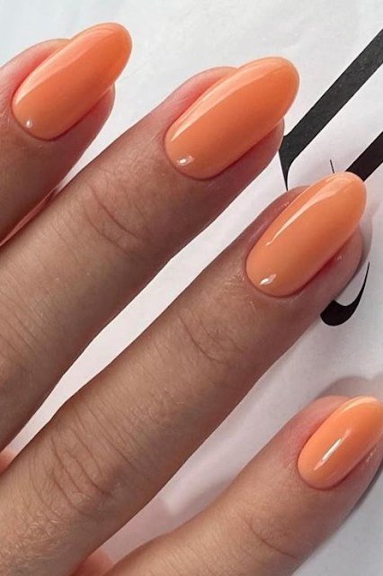 Peach coral almond nails glossy