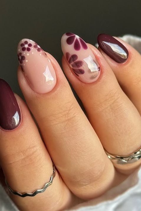 Burgundy nails with white dot floral accents for women over 50