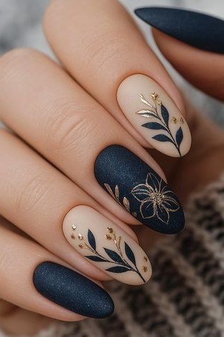 Navy and nude with gold botanical art almond, elegant fall nail design for women over 40