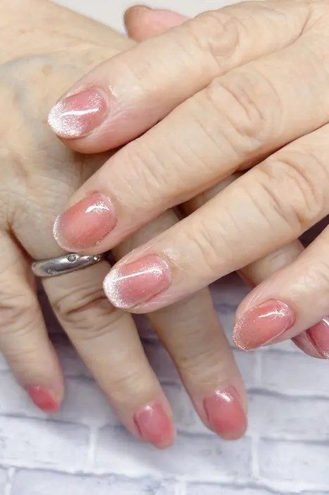 pink nails with silver glitter french tips, glitter french manicure for mature hands