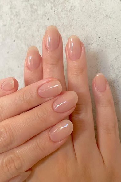 Pale Nude Beige Short Flat Hands - elegant nude nail design for women over 60