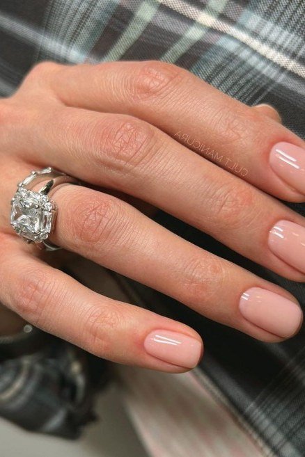 Classic Nude Pink with a Diamond Ring - short nude nail idea for women over 50